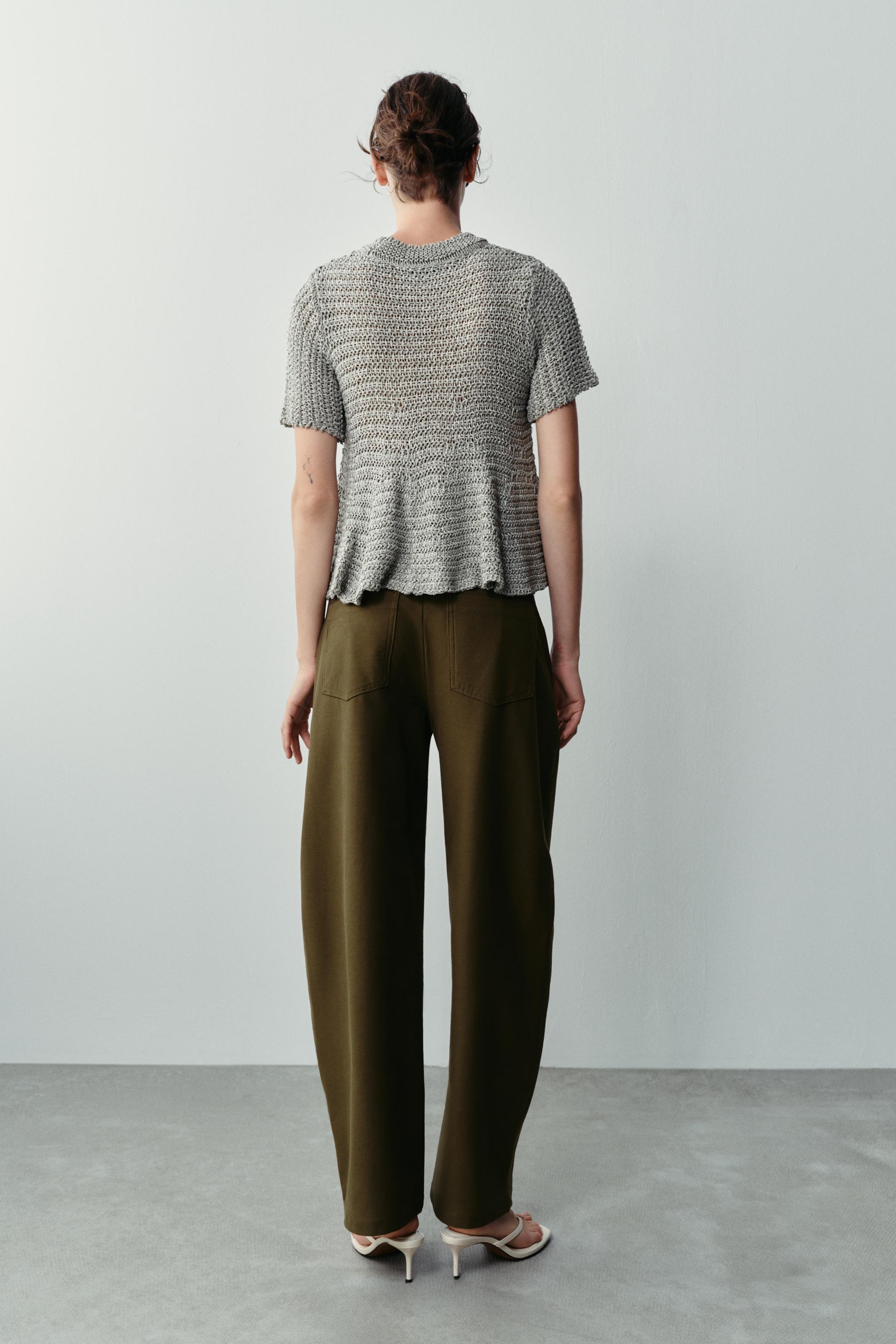 OPEN-KNIT PEPLUM TOP